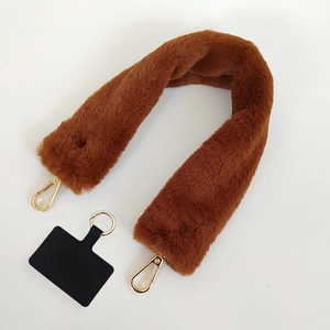 Brown plush phone lanyard strap with golden metal clasps and secure black attachment tab
