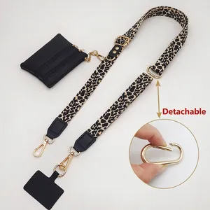 Crossbody leopard print phone strap with detachable coin purse and gold hardware