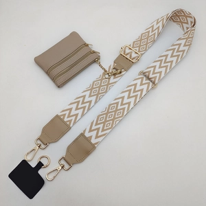 Adjustable woven crossbody phone strap with a khaki leather zipper pouch and gold hardware