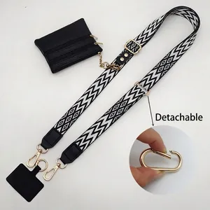 Adjustable crossbody phone strap with black and white wave pattern and detachable pouch