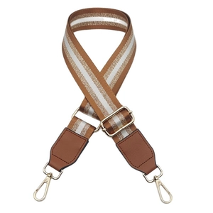 Adjustable wide woven shoulder strap with brown and gold stripes and metal hooks