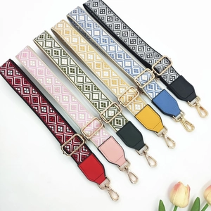 Adjustable jacquard bag straps in colorful geometric ethnic patterns with gold hooks