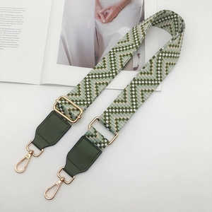 Adjustable woven shoulder strap in army green geometric pattern with gold metal clasps