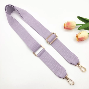 Detail of adjustable lavender cotton canvas bag strap with light gold metal lobster hooks