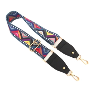 Bandoulière réglable colorée avec motif jacquard géométrique et boucles en métal doré