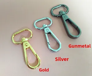 Close-up of swivel lobster clasps in gold silver and gun black for bag straps