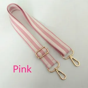 Adjustable pink and white striped woven strap with gold metal swivel hooks for handbags