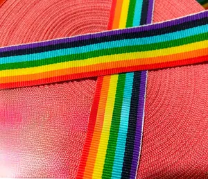 Macro detail of rainbow striped polyester lanyard with high-density woven texture