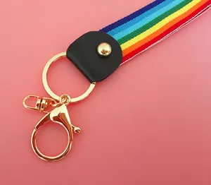 Rainbow woven lanyard strap with golden metal clasp and black leather connector