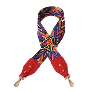 Adjustable wide canvas shoulder strap with colorful geometric weave and gold hardware