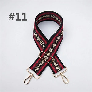 Ethnic style colorful wide bag strap with red geometric pattern and gold metal hooks