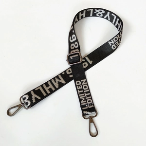 Detail of adjustable nylon strap with Limited Edition text and gunmetal swivel hooks