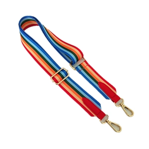 Adjustable rainbow striped canvas bag strap with golden metal hooks and red leather accents