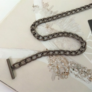 Chic gunmetal flat chain link accessory for handbags with a minimalist toggle clasp