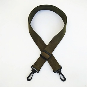 Detail of army green canvas strap with black plastic carabiner hooks and slider buckle