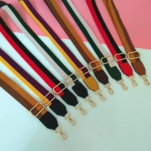 Adjustable striped canvas shoulder strap for handbags with gold-tone metal buckles