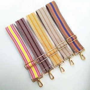Ethnic style woven wide shoulder straps with colorful geometric patterns and gold buckles