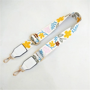 Adjustable floral shoulder strap with colorful ethnic patterns and golden metal hooks