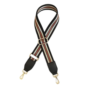 Adjustable nylon shoulder strap with classic red and green stripes and gold hardware