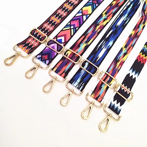 Adjustable ethnic style crossbody bag straps with colorful patterns and gold metal hooks