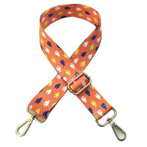 Adjustable orange wide crossbody bag strap with colorful cartoon fish prints and gold clips