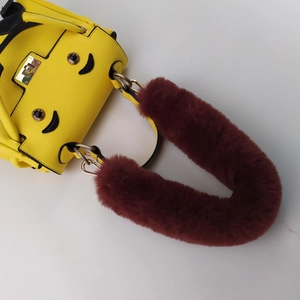 Bright yellow PU leather handbag with luxury brown faux fur handle and gold metal hardware
