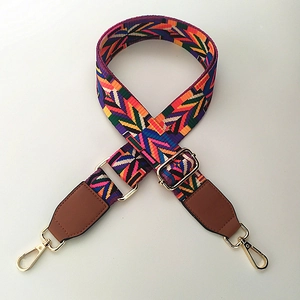 Adjustable ethnic geometric jacquard bag strap with gold metal lobster hooks and brown leather