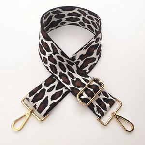 Adjustable leopard print bag strap with polished light gold metal lobster clasps