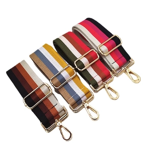Adjustable wide cotton strap with colorful stripes and gold hardware for crossbody bags