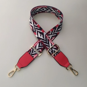 Ethnic style wide bag strap with red geometric jacquard weaving and gold metal hooks