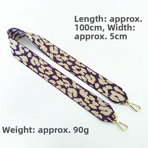 Detail of leopard print nylon bag strap with gold metal hooks, 100cm length and 5cm width