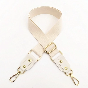 Adjustable cream canvas shoulder strap for bags with durable gold metal lobster clasps