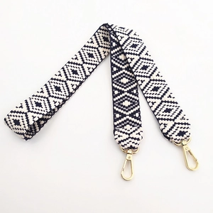 Ethnic blue and white geometric woven purse strap with golden metal swivel hooks