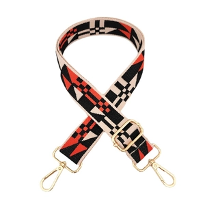Adjustable wide replacement bag strap with orange and black geometric pattern and gold clips
