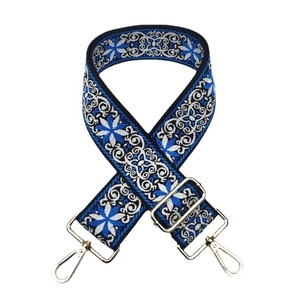 Ethnic style embroidered bag strap in blue and white with gold metal hardware adjusters