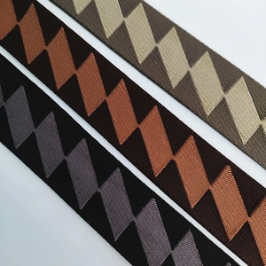 Detailed close-up showing thick woven fabric shoulder straps with geometric zigzag patterns