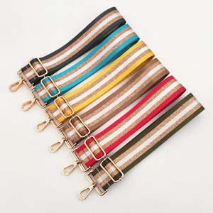 Adjustable wide nylon bag straps with gold stripes and metallic hardware in six colors