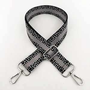 Close-up of 3.8cm wide replacement strap with speckled pattern and silver metal buckles