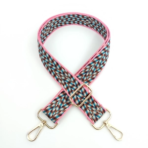 Adjustable colorful woven wide shoulder strap with geometric patterns and gold metal buckles
