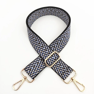 Adjustable woven shoulder strap for bags with blue and black herringbone pattern and gold clips
