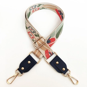 Adjustable floral embroidered shoulder strap with gold hardware for handbags