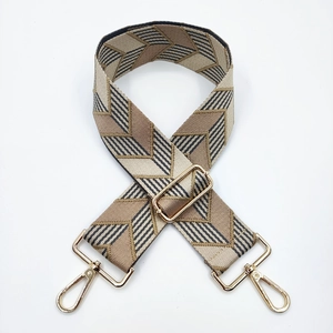 Detail of adjustable woven replacement shoulder strap with V-shaped geometric patterns