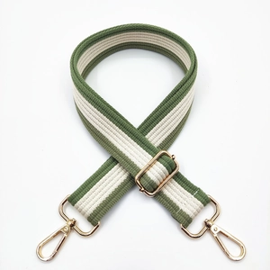 Adjustable wide canvas crossbody bag strap in green and beige stripes with gold hardware