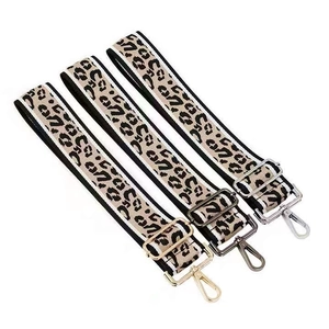 Leopard print embroidered wide bag strap with gold, silver and black hardware clips