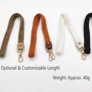 Knitted crossbody strap with gold metal hooks and faux leather accents in multiple colors