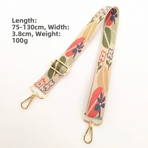 Floral embroidery bag strap detail with gold buckle, adjustable 75-130cm length