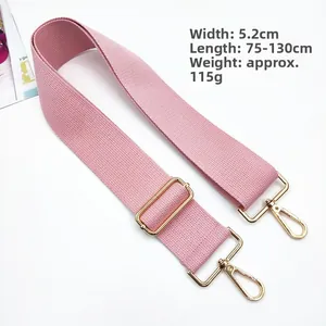 Adjustable pink 5.2cm wide woven shoulder strap with gold lobster claw clasps and metal buckle