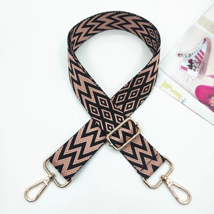 Adjustable wide replacement bag strap with pink and black geometric zigzag weaving