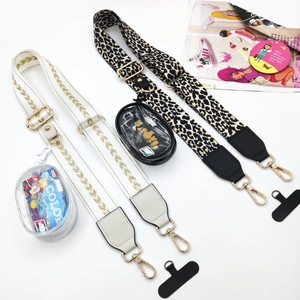 Detail view of adjustable canvas shoulder straps with leopard print and wheat pattern