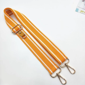 Detail of orange striped fabric phone strap with adjustable gold lobster clasps